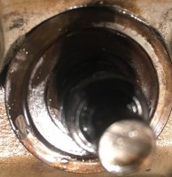 Valve guide with seal in place before I removed it.